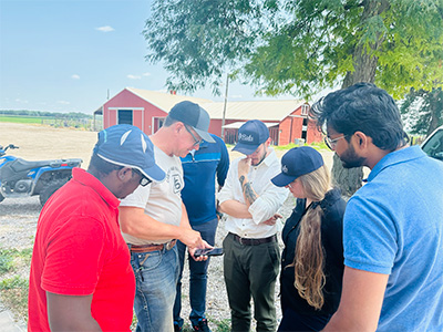 People standing around outside in group