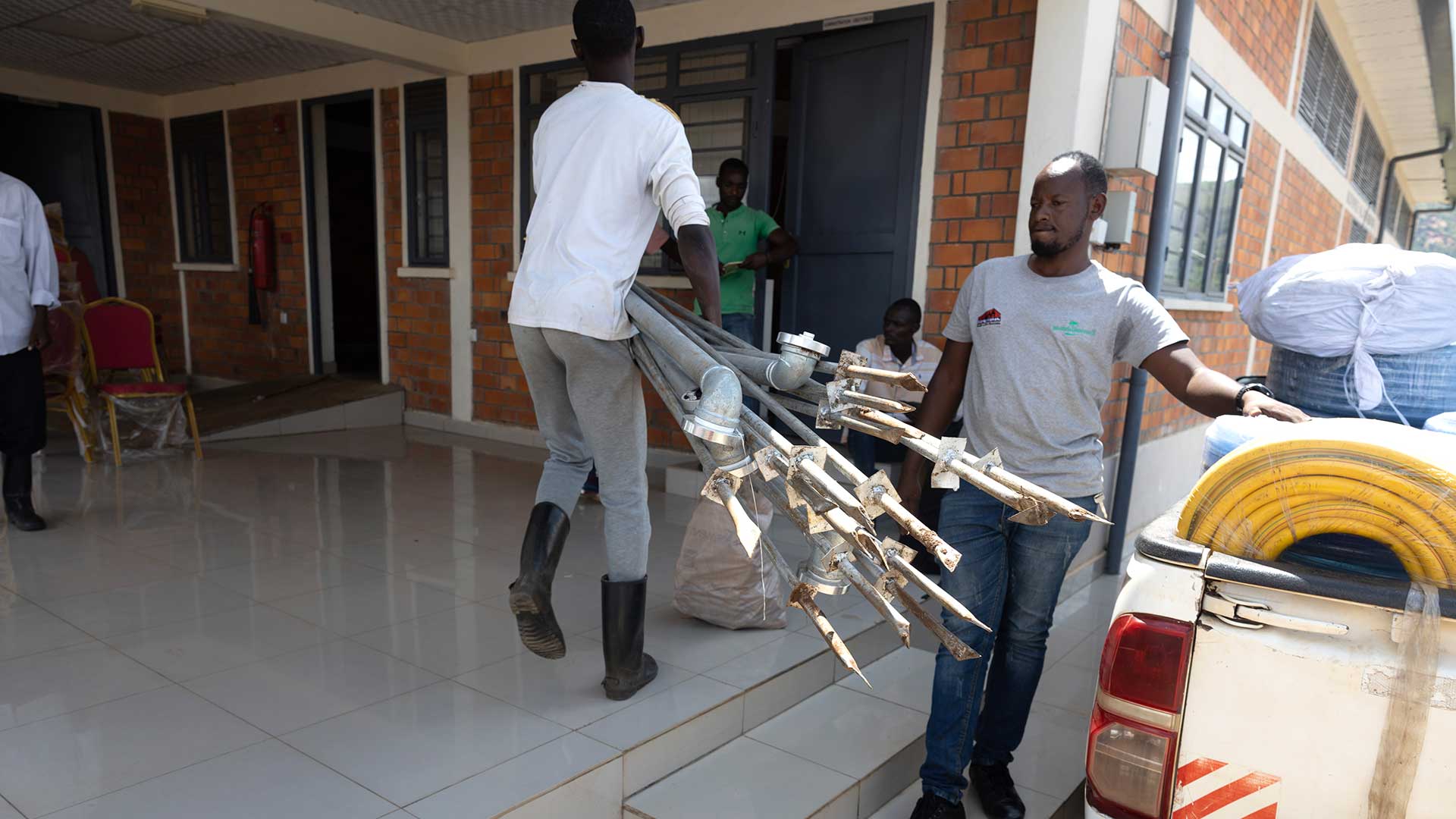 Two people moving large items