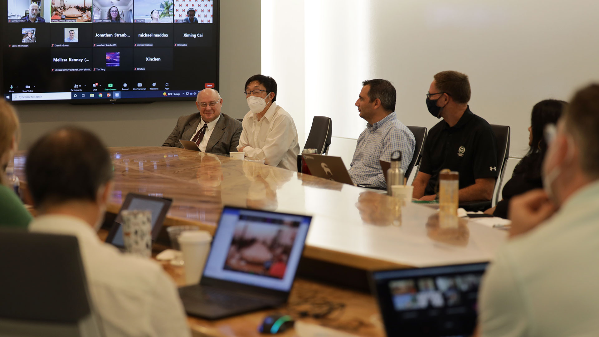 People sitting at table in meeting