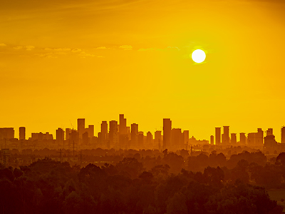Orange sunset over city skyline