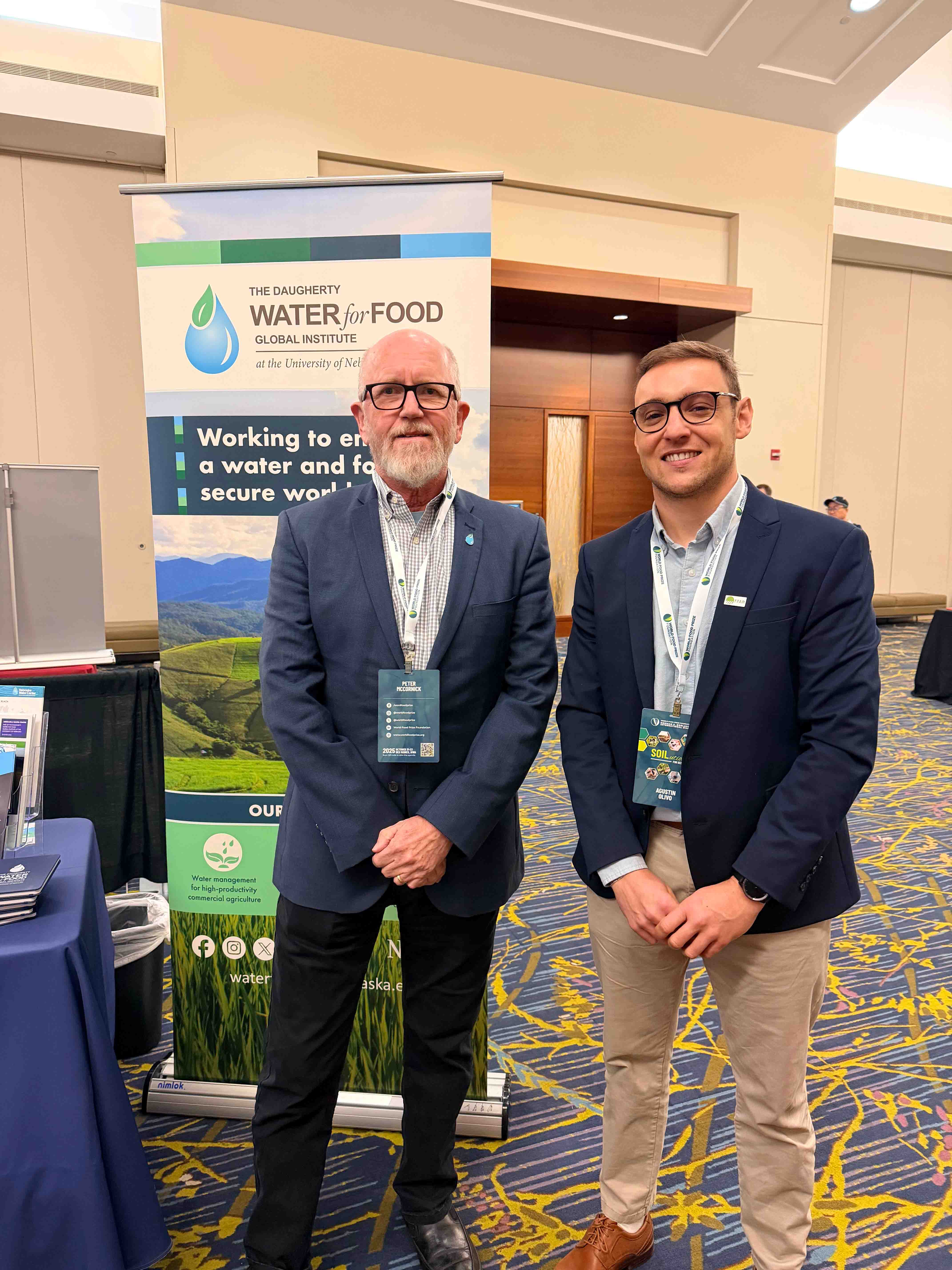 DWFI Executive Director Peter McCornick and past-DWFI support student Agustín Olivo at Borlaug Dialogue 2025.