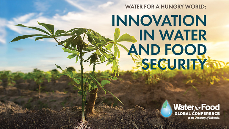 Conference banner showing a young crop plant in a field at sunrise with the text “Water for a Hungry World: Innovation in Water and Food Security” and the Water for Food Global Conference logo.