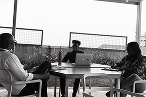 People sitting around table talking