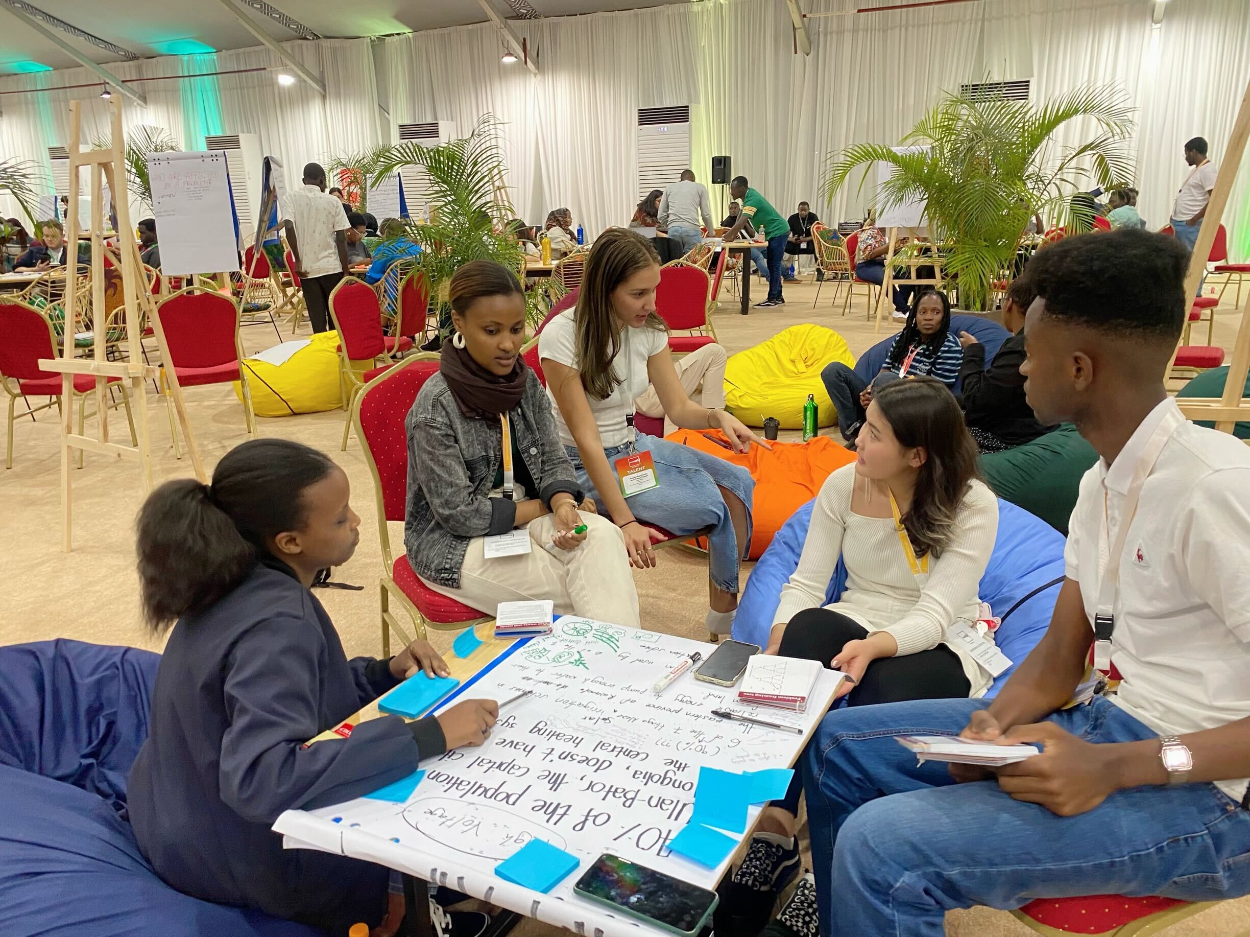 Clare working with her team at Unleash Rwanda to explore global challenges