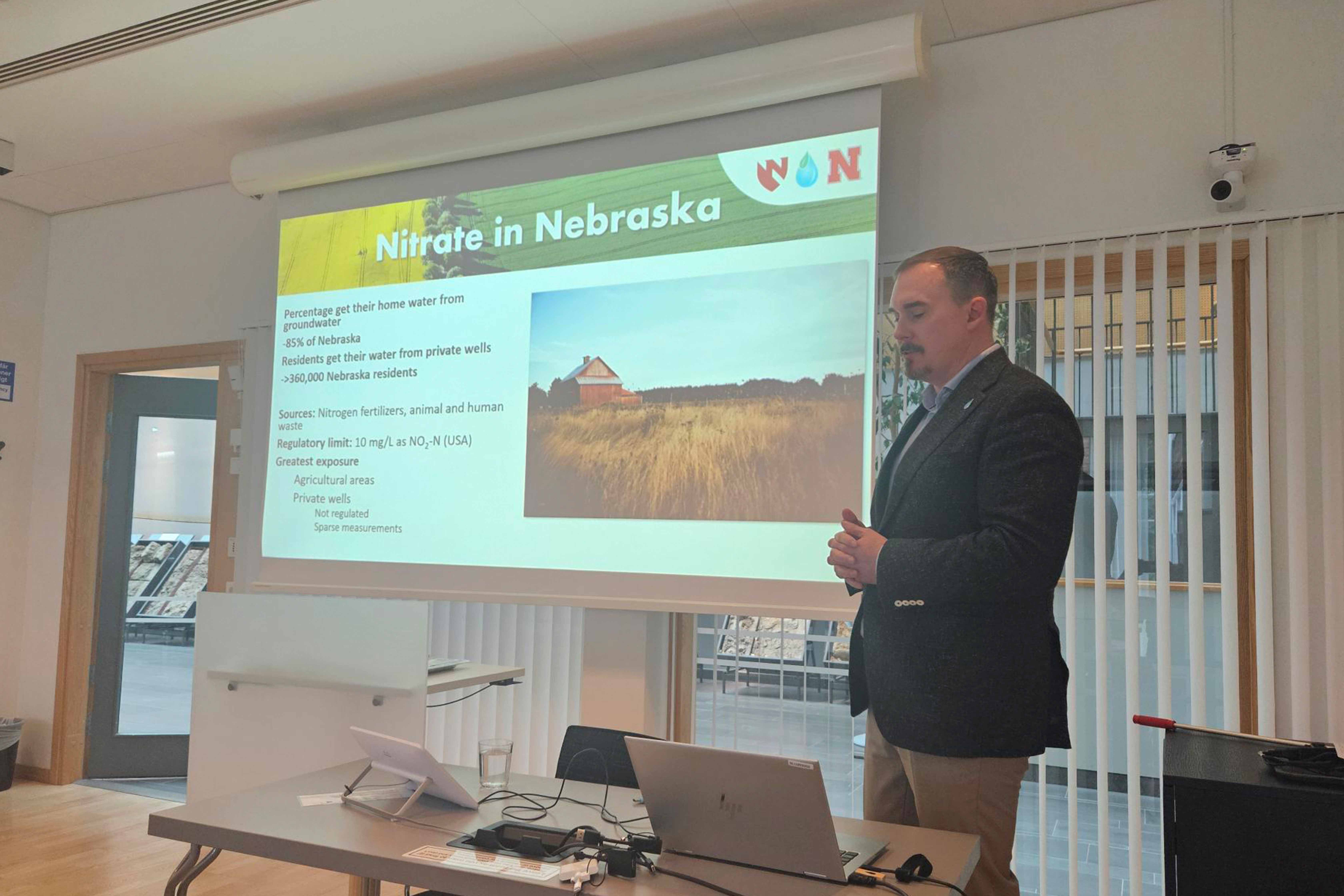  DWFI Director of Water, Climate and Health Jesse Bell presents during the workshop in Uppsala, Sweden on August 28, 2026. 