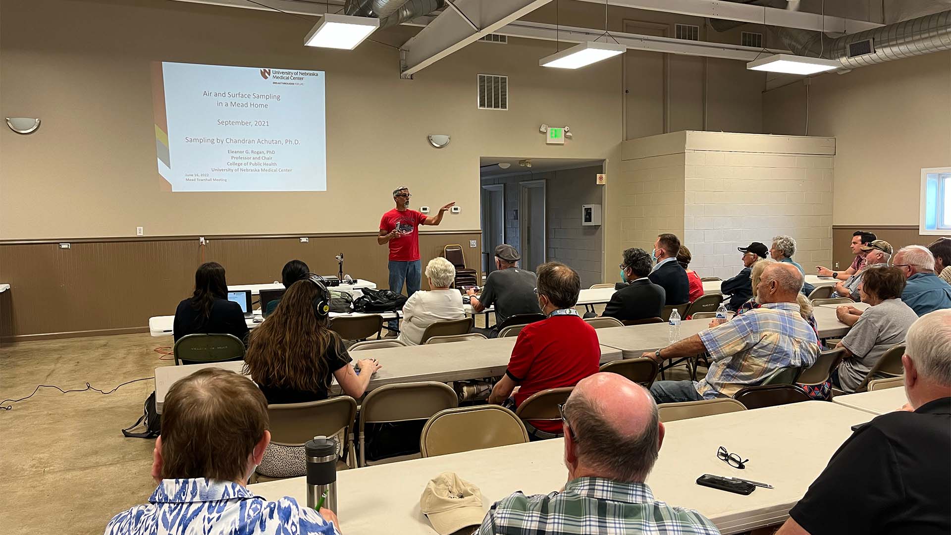 Person giving presentation to audience