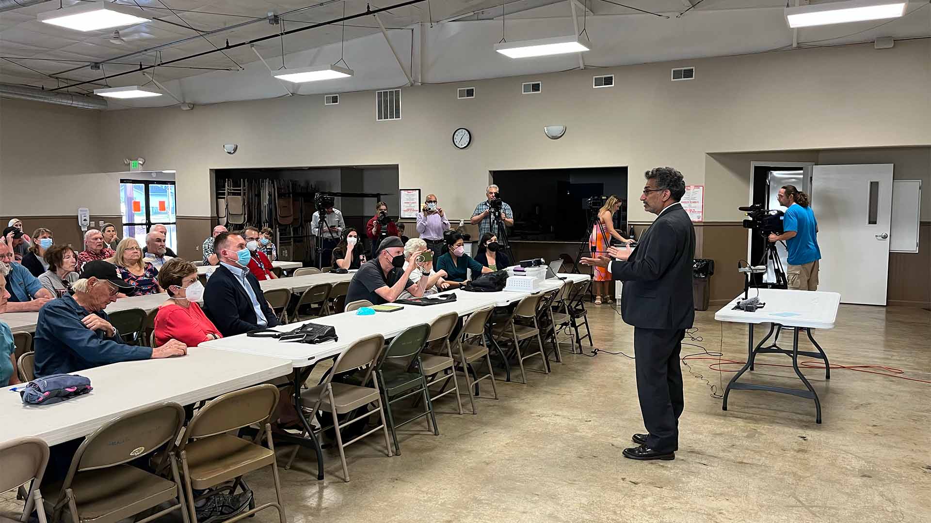 Person giving presentation to audience