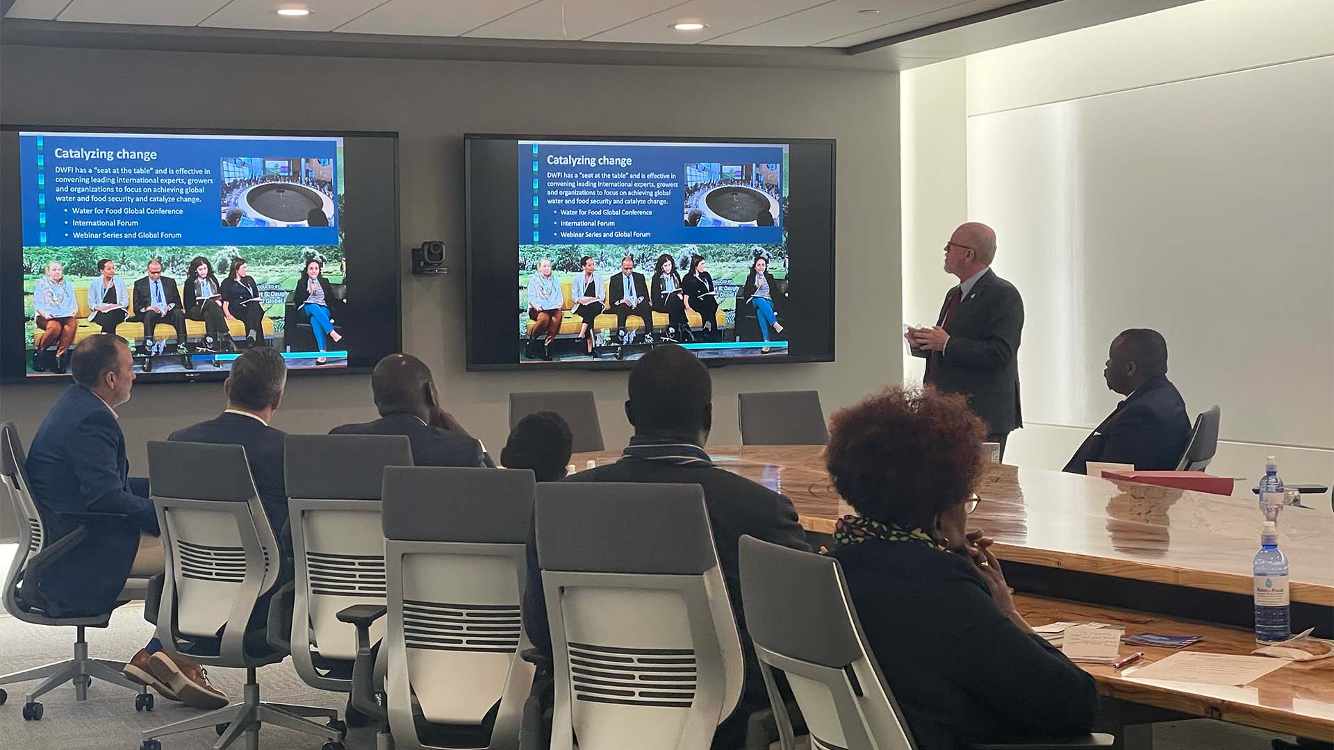 People convening in conference room