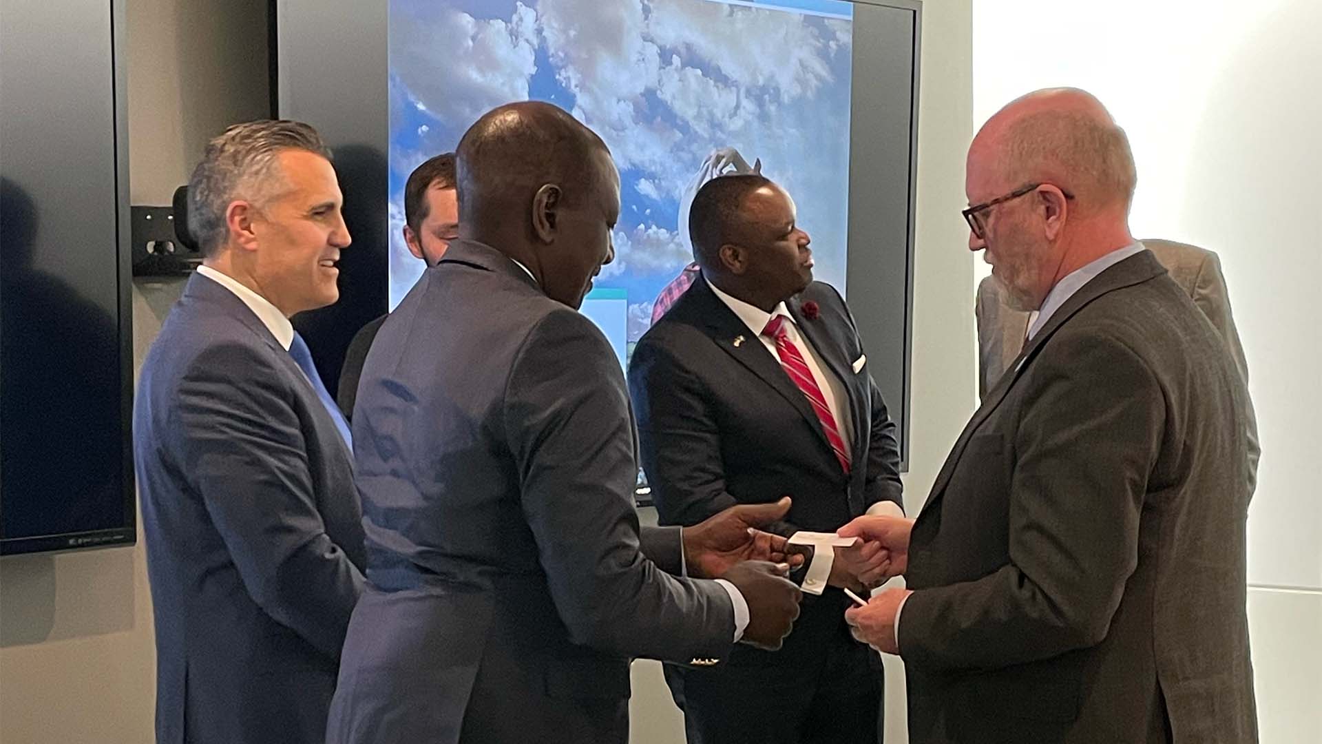 Several people meeting in small group