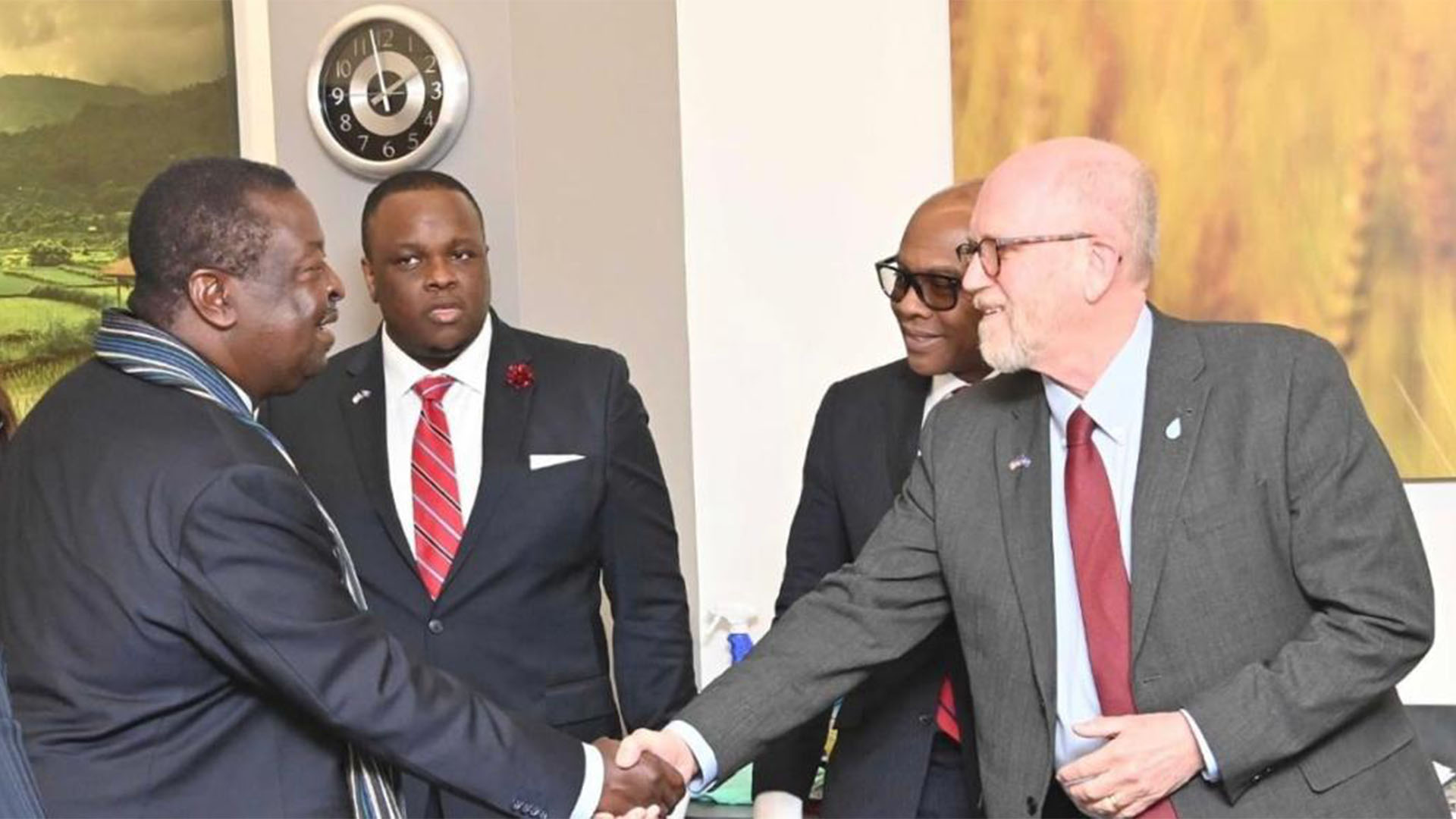 Small group shaking hands