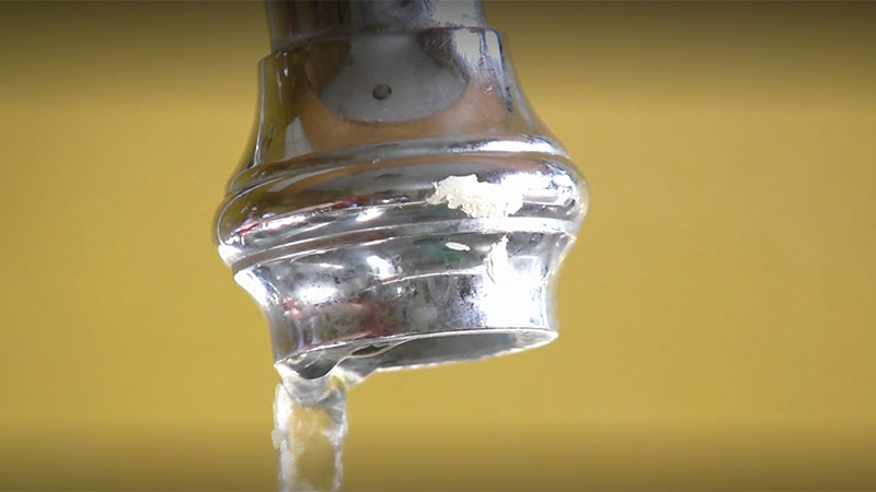 Water running out of faucet