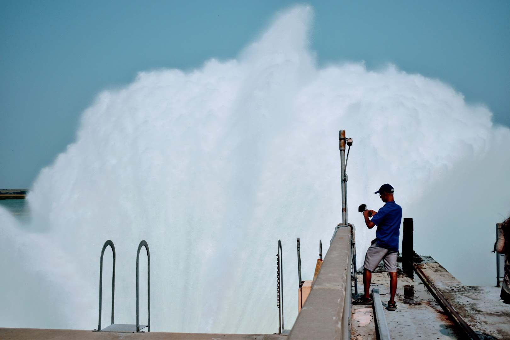 Person standing in front of spraying water