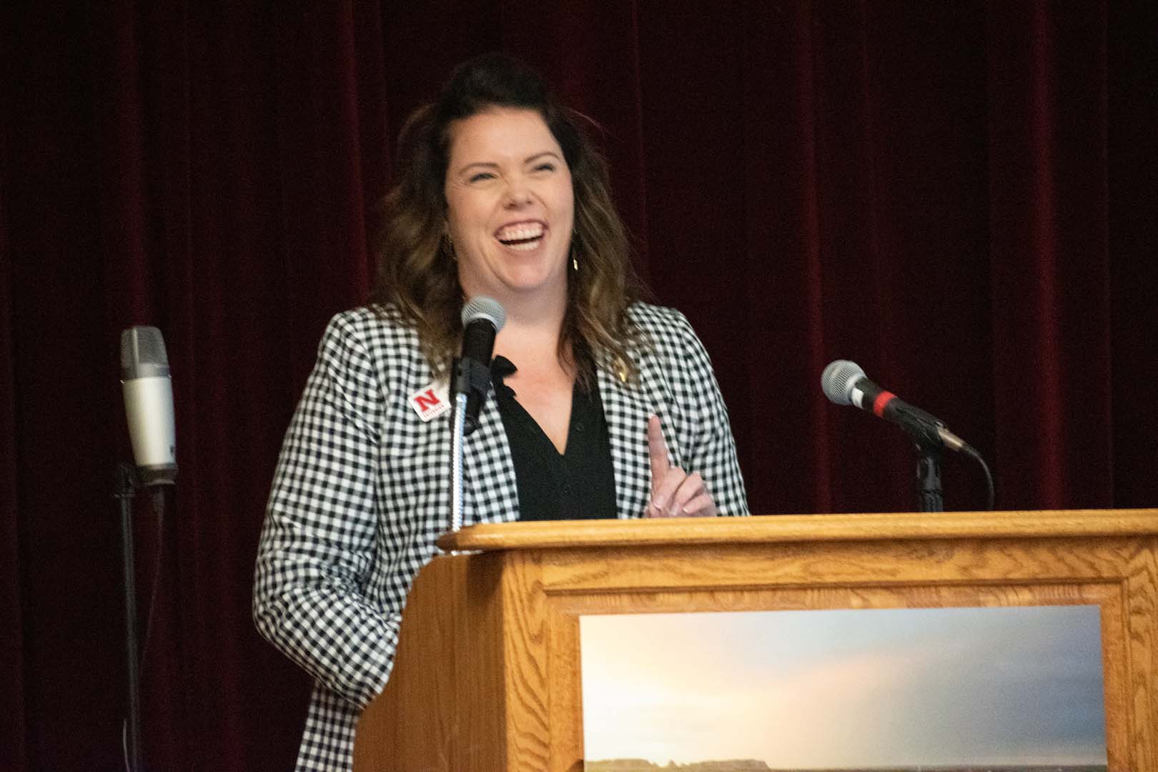 Person presenting at podium