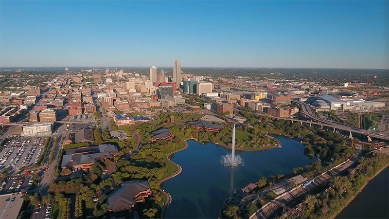 Ariel view of city with lake in foreground