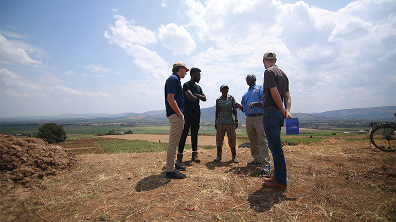 Four people in group having discussion